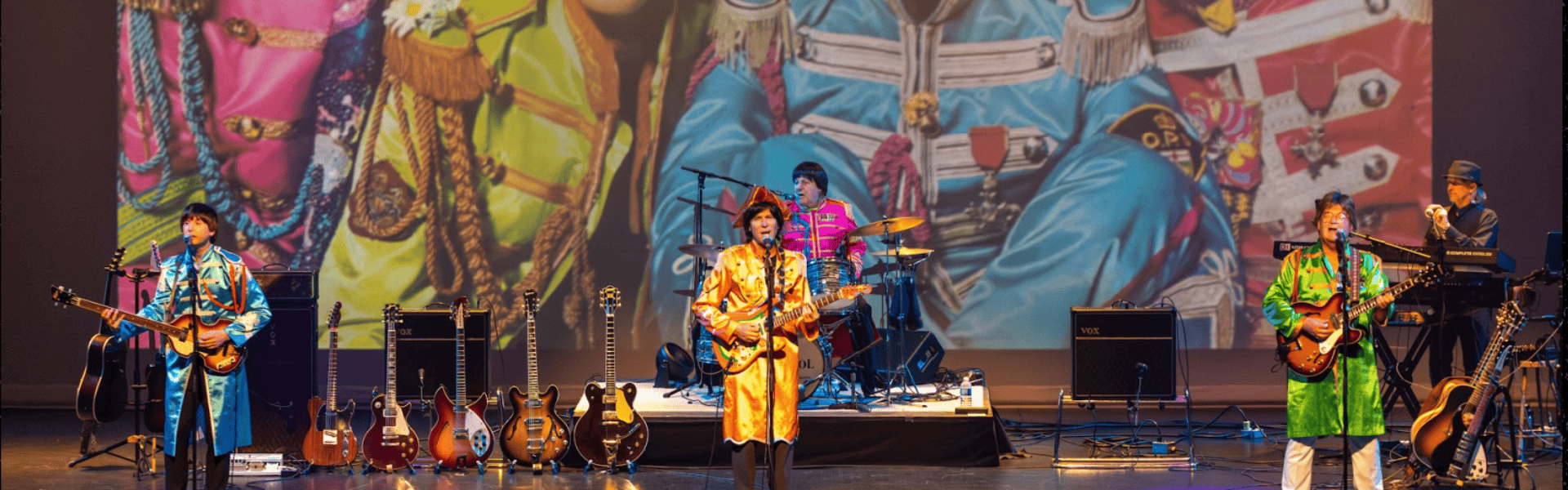 Image of a band performing onstage
